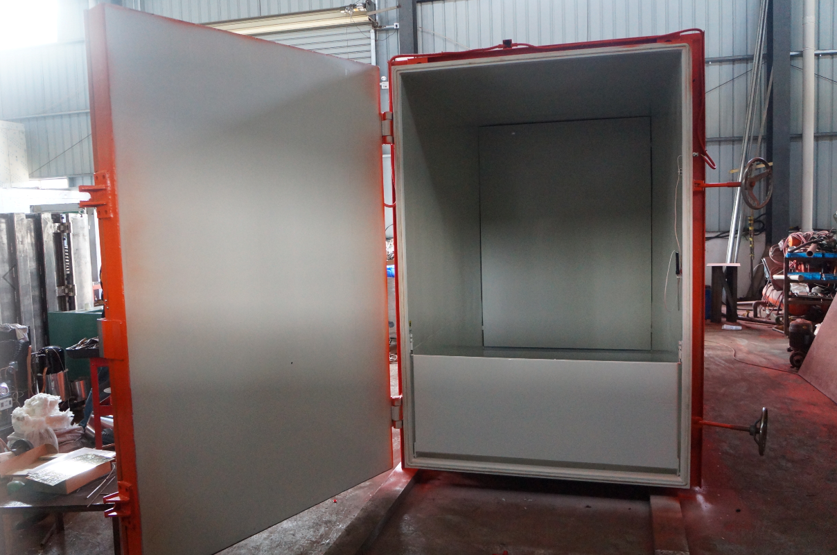 A wide-angle view of the fully opened vacuum chamber, designed for seamless forklift or trolley access. A wide-angle view of the fully opened vacuum chamber, designed for seamless forklift or trolley access.